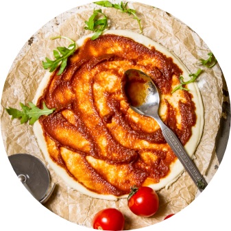 sauce on an un-baked pizza